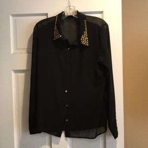 Black button up shirt with gold on the collar
